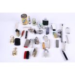 A collection of assorted novelty cigarette lighters. Including padlock, corn cob, Cohiba cigar, etc.