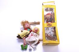 A collection of three vintage girl Pelham puppets. Including 'Dutch Girl' #SS2 boxed, etc.