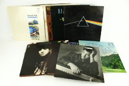 A large collection of vinyl LP 33 RPM records.