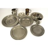 An assortment of vintage pewter and white metal.