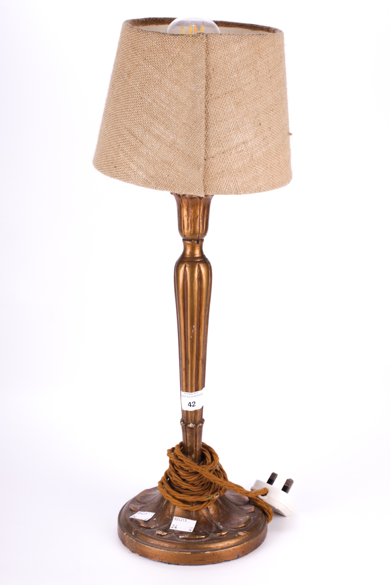 A vintage French style gilt wood table lamp. With acanthus leaf decorated base and top.