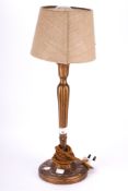 A vintage French style gilt wood table lamp. With acanthus leaf decorated base and top.