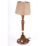 A vintage French style gilt wood table lamp. With acanthus leaf decorated base and top.