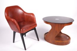 Vintage / Retro : An oval coffee/occasional table and a Gio Ponti style CTC Romania armchair.