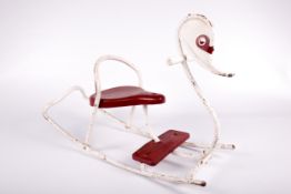 A vintage Mobo child's rocking chair.