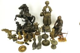 A collection of pewter and metal figures.