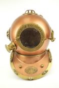 A reproduction full size diving helmet manufactured by Anchor Engineering.
