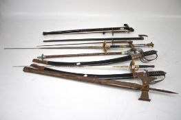 A collection of 19th century and later swords.