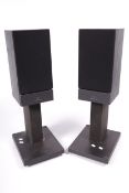 A pair of Linn Index bi wired stereo speakers on stands.