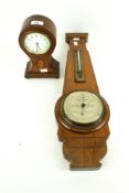 A early 20th century mantel clock and a Taylor, Short and Mason barometer.