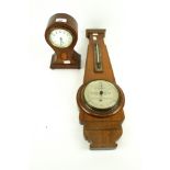 A early 20th century mantel clock and a Taylor, Short and Mason barometer.