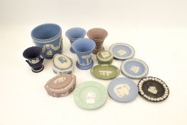 A collection of assorted Wedgwood Jasperware. Including small urns, plates and trinket boxes, etc.