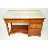 A contemporary marble top hard wood single pedestal desk workstation.