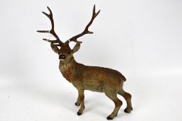 A spelter figure of a stag. In naturalistic pose, H20.
