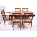 Vintage / Retro : G-plan Red extending teak dining table and five chairs.