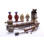 A collection of six assorted copper and white Tibetan metal prayer wheels,