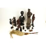 A collection of assorted 20th century international carved wooden figures.