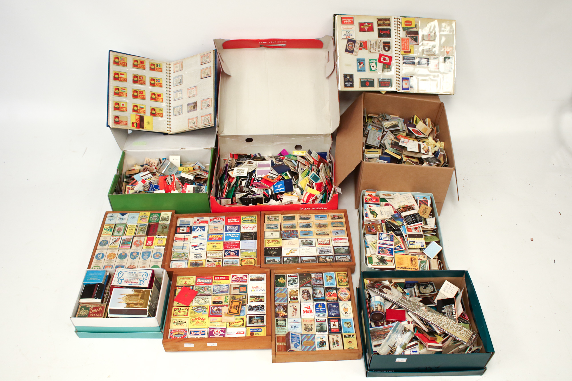 A large collection of vintage matchboxes and match books.