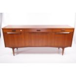 Vintage / Retro : A teak three sectional sideboard.