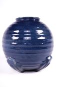 Art Deco : A spherical ceramic vase. With reeded decoration and four Art Deco feet etc.