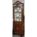 An Edwardian mahogany two section corner display cabinet.