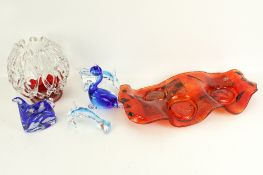 A collection of six assorted contemporary glass items. Including Kosta Boda and Murano, etc. Max.