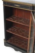 A Victorian ebonised and gilt and gilt brass Pier Cabinet with glassed door ,