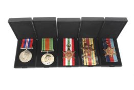 A group of five WWII medals, comprising; Stars for North Africa (8th Army bar), Italy and 1939-45,