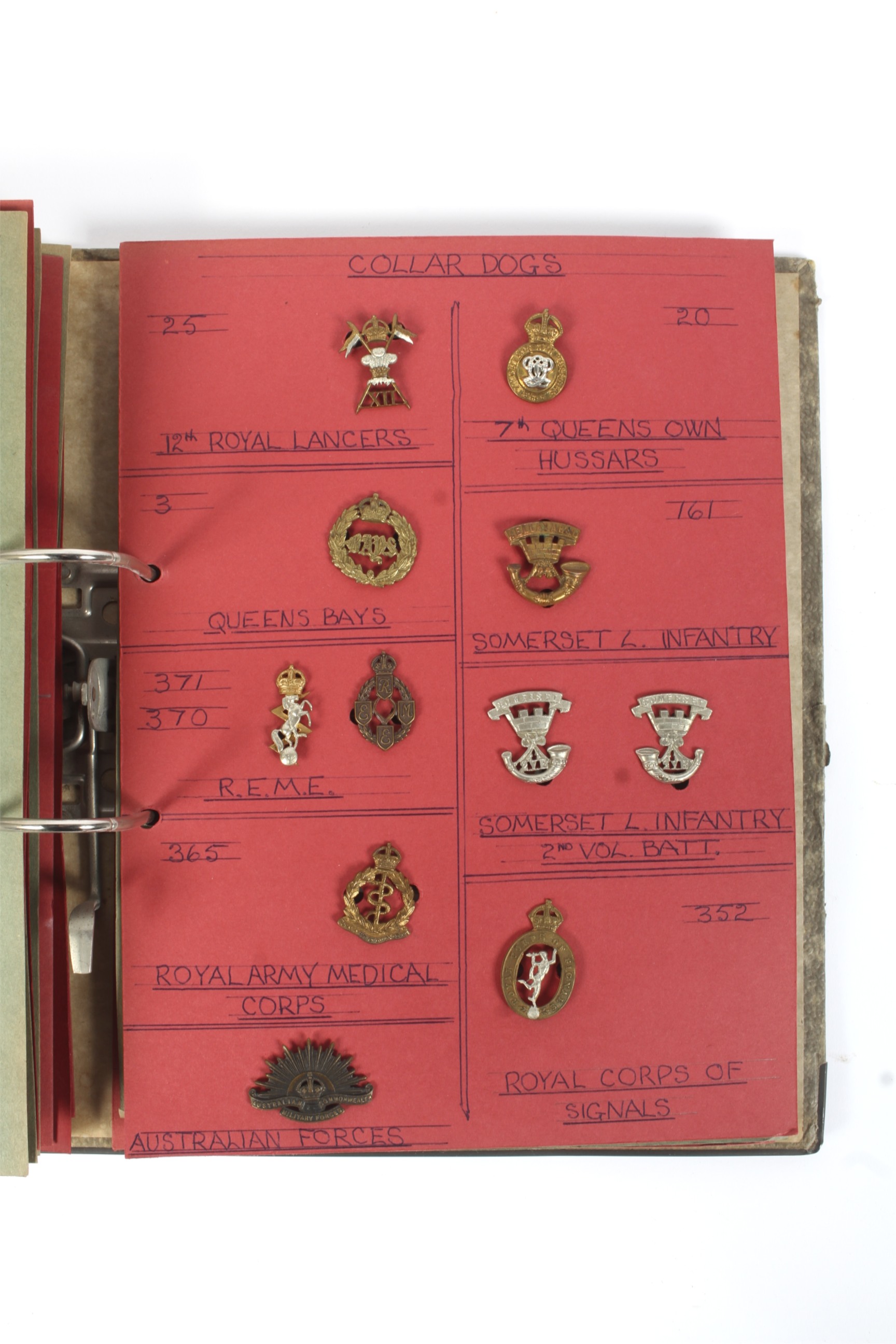 A collection of assorted sixty eight vintage military collar dogs badges.