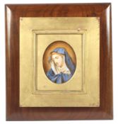 A framed late 19th century oval portrait miniature of the Virgin Mary, watercolour on ivory. 8.