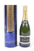 A bottle of Jacquart Champagne. With tin