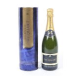 A bottle of Jacquart Champagne. With tin