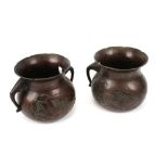 A pair of 20th century Chinese cast meta