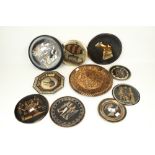 Eleven assorted Egyptian metal plates. M