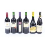 Six bottles of red wine. Comprising: Pin