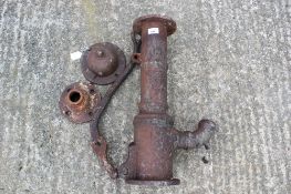 A vintage iron pump. Disassembled, H57cm