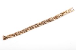 An early 20th century rose gold expanding watch bracelet.