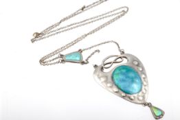 A Charles Horner Art Nouveau silver and enamel pierced drop-shaped pendant necklace.