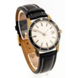 Swiss, a vintage gentleman's gold-plated and stainless steel automatic wristwatch.