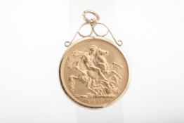 An Edward VII sovereign, 1910, loosely mounted in a 9ct gold pendant.