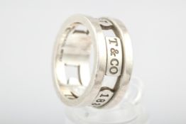 A Tiffany & Co 1837 broad band ring.