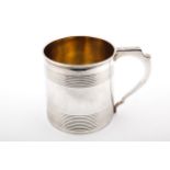 A George III silver christening mug.