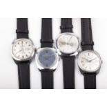 Four vintage gentleman's stainless steel tonneau or cushion-shaped shaped wristwatches, circa 1970.