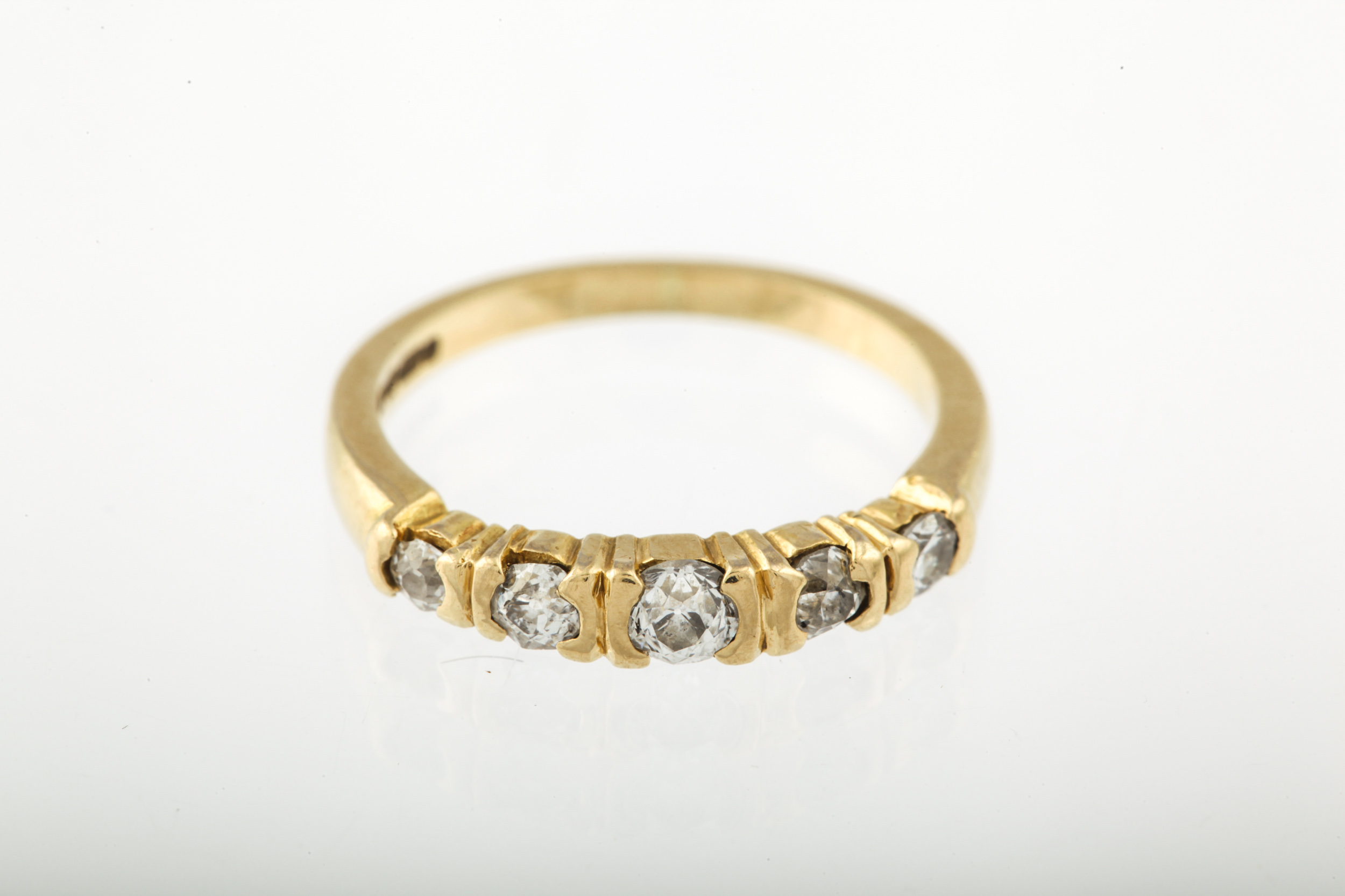 A modern 18ct gold and diamond five stone ring. The graduated old-cut stones approx. 0. - Image 10 of 10