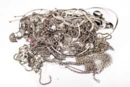 A collection of silver and white metal necklaces and other items,