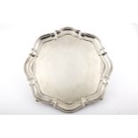 A silver shaped-round salver.