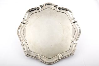 A silver shaped-round salver.