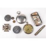 A small collection silver and metal items.
