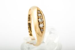 An early 20th century 18ct gold and small diamond five stone gypsy ring.