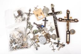 A large collection of Latin and other religious crosses, crucifixes, St Christopher pendants etc.